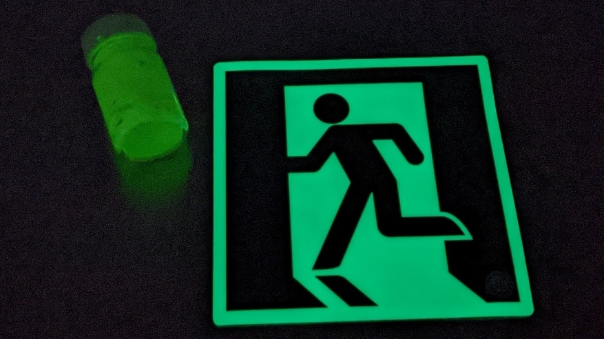 Glow-in-the-dark materials and a common application in exit signs
