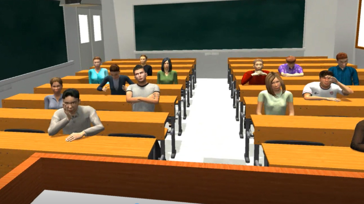 A group of people sitting in a lecture hall